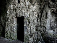 Hidden dark room inside catholic cave