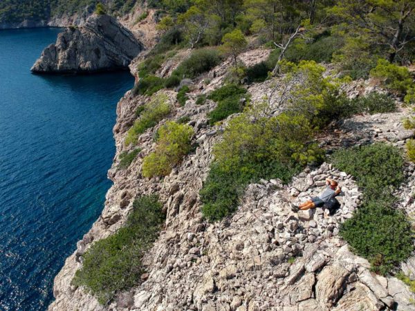 Stone sofa built into cliff front