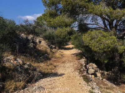 Dry stone dusty path in the sun to Cap Andritxol