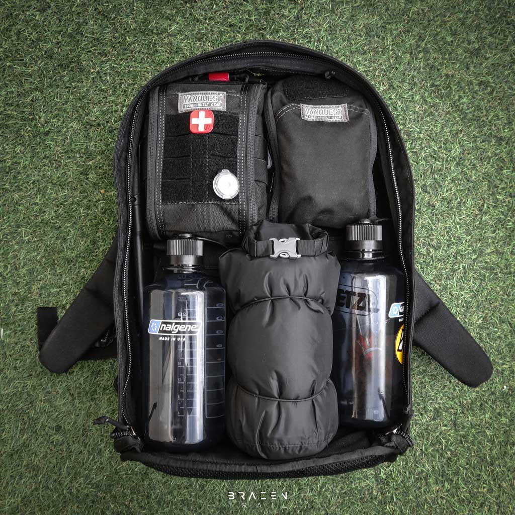 source ILPS inside goruck black gr1 with Nalgene bottle