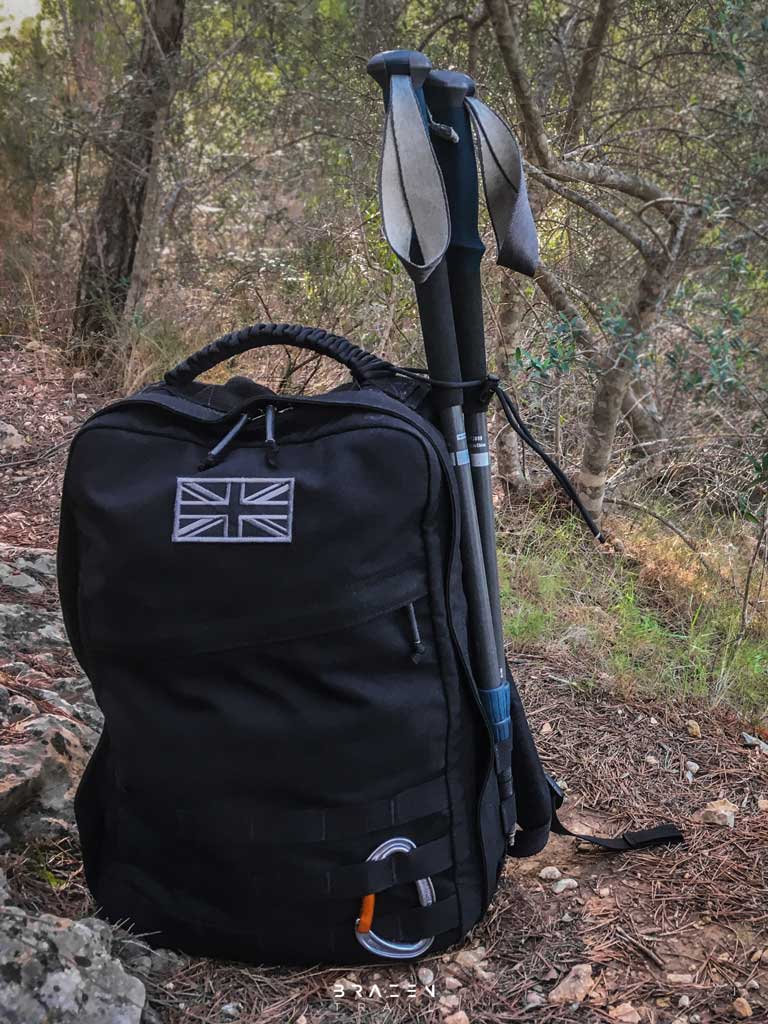 trekking poles attached to Goruck GR1